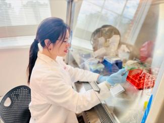 Shuyue Zhan, speaker, in lab setting