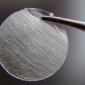 Detail of a nanofiber spool produced by an ultra-fast, touch-spinning technology which can produce thousands of yards of nanofibers in a matter of minutes.